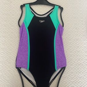 One piece Never Worn Kid bathing suit.  size 8-10